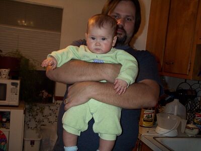 Daddy holding me