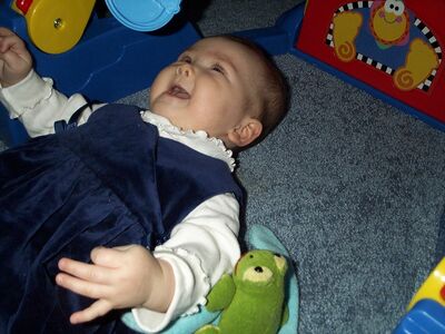 Me smiling in my blue dress