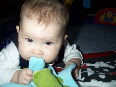Me in my blue dress eating the glove