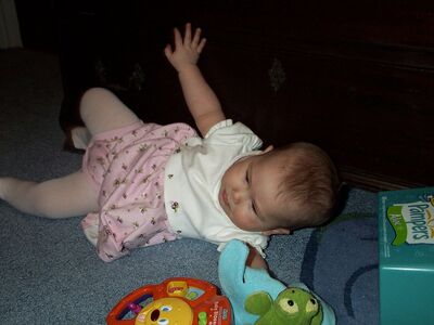 Me in my pink dress rolling over